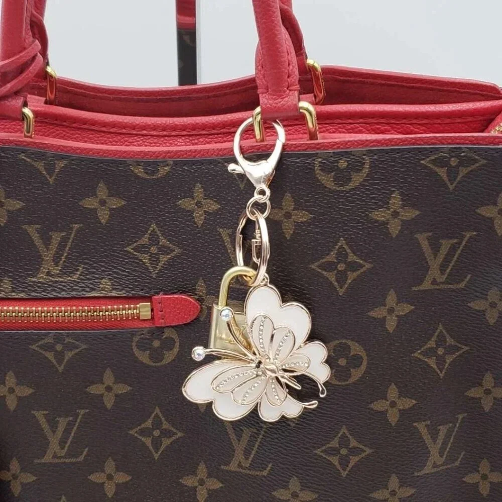 Authentic Louis Vuitton Lock & Key with unbranded Butterfly Bagcharm, Keycharm